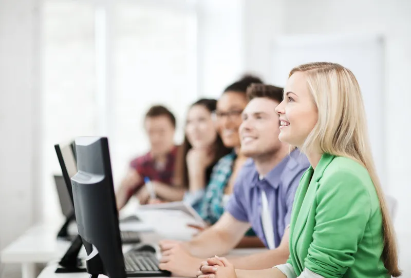 Students at computers in a classroom