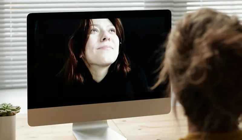 A participant views a woman's face on screen — a study of responses to social stimuli