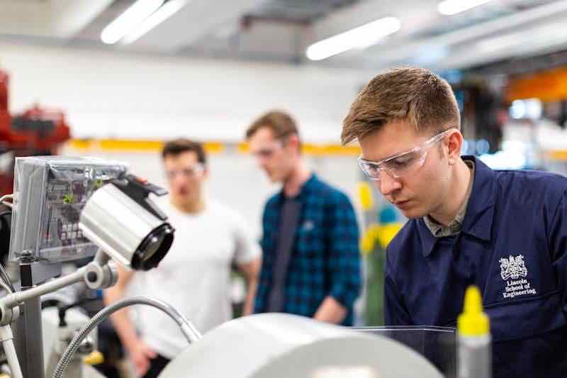 Engineer configuring precision instrumentation
